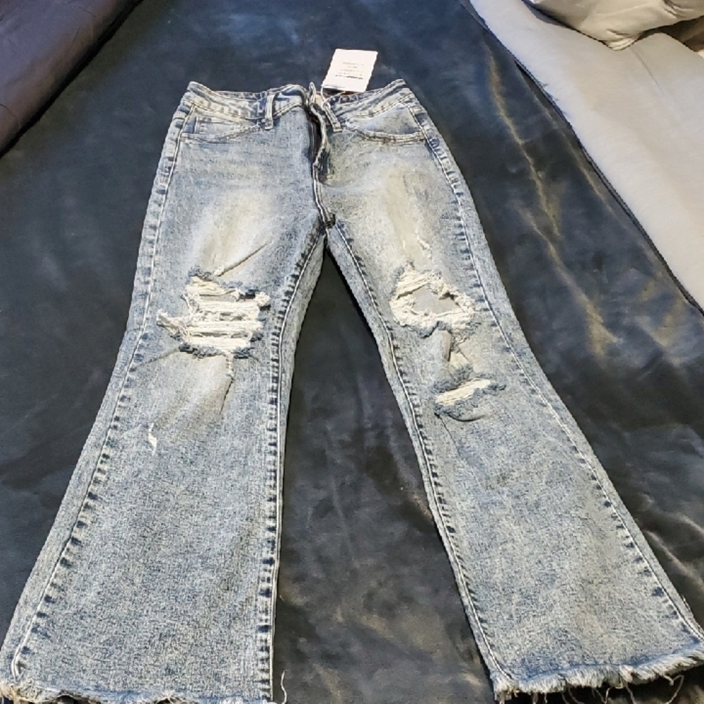 Light Blue Women's Distressed Flare Jeans with Raw Hem - Picture 3 of 6